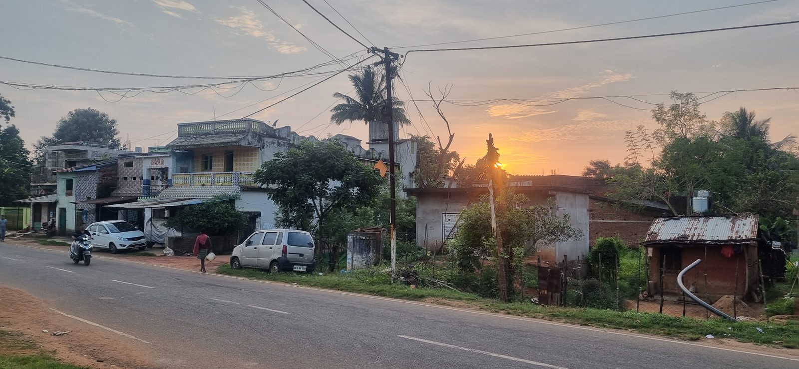 Sunset over the village road