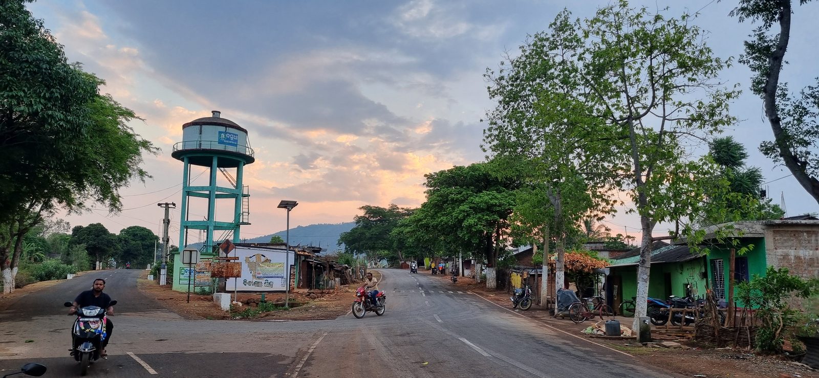 The village water tower against an evening sky